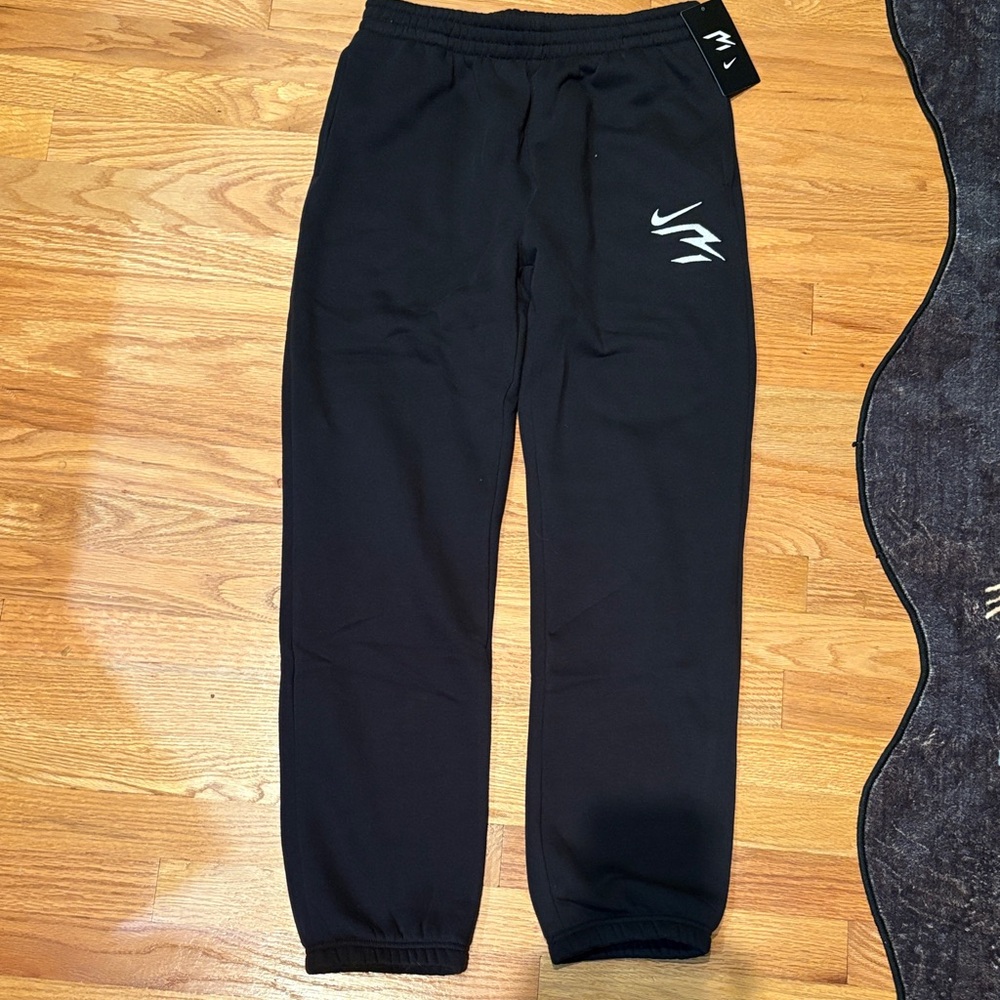 Nike Kids Black Sweatpants with White Logo